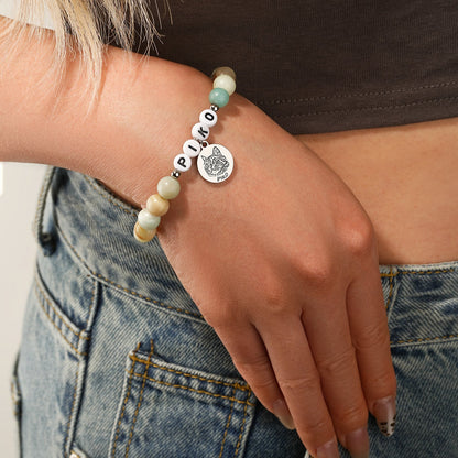 Bracelet de perles en forme de visage d&